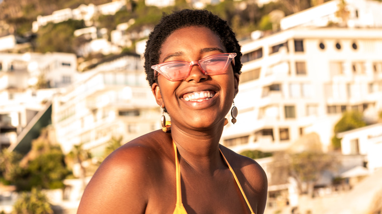 Woman in pink shades