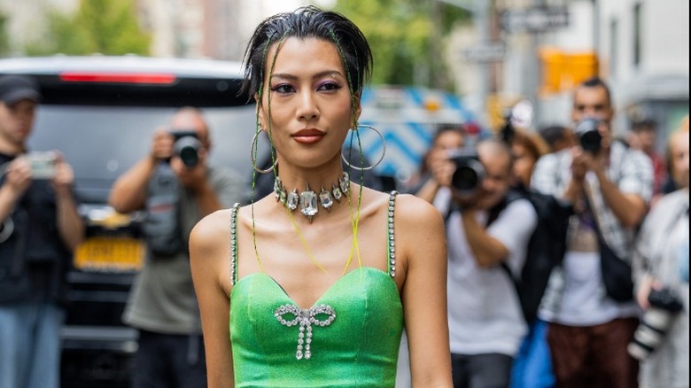 woman with chunky crystal necklace