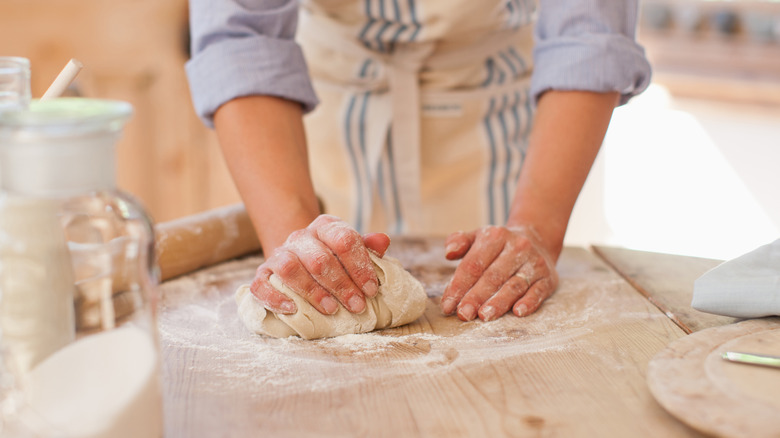 hands baking bread
