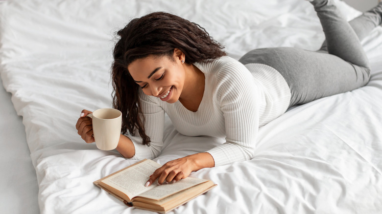 woman reading in bed