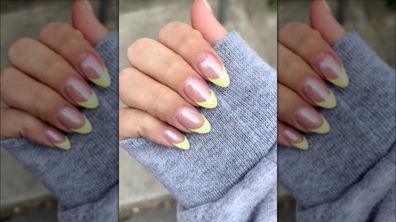 Yellow French tips chrome manicure