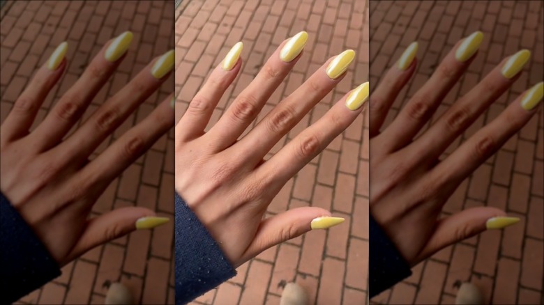 Pastel yellow chrome nails
