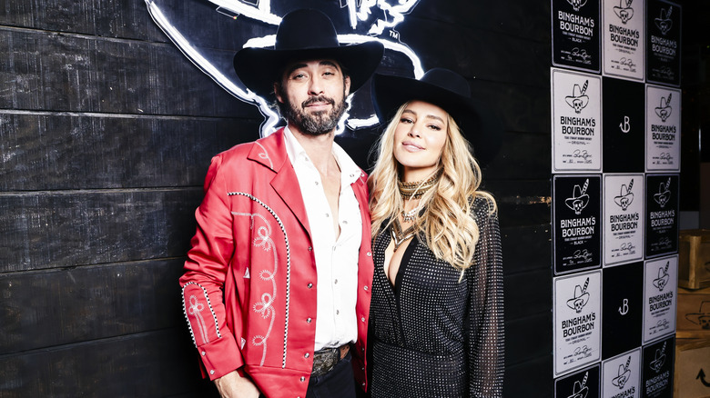 Ryan Bingham and Hassie Harrison at Bingham's Bourbon NFR After Party in 2023.