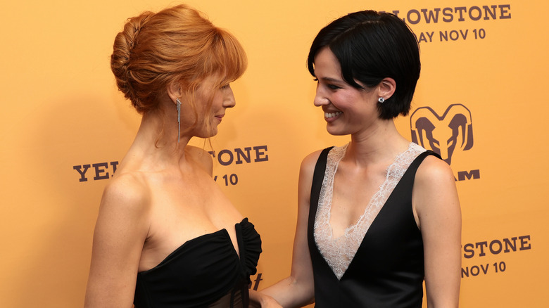 Kelly Reilly and Kelsey Asbille posing on the red carpet together.