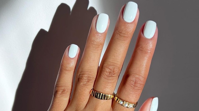 white nails and rings