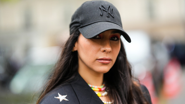 woman wearing stylish Yankees baseball hat