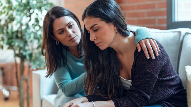 Woman offers friend reassurance 