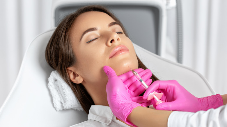 chin filler injection on woman