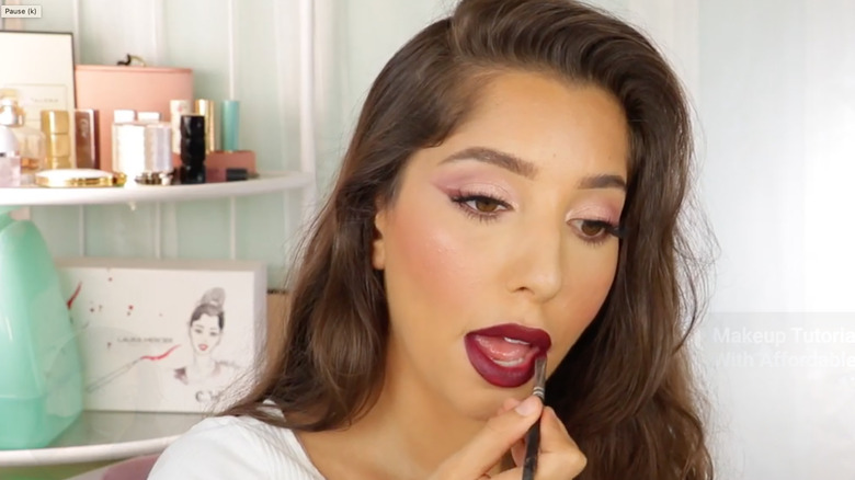 Burgundy lipstick with lip brush