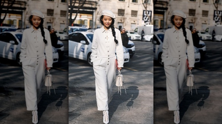 woman wearing white jumpsuit 