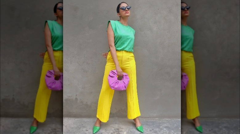 woman wearing green and yellow color block