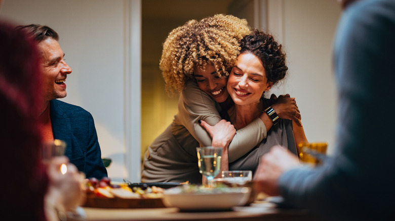 Women hugging at a party