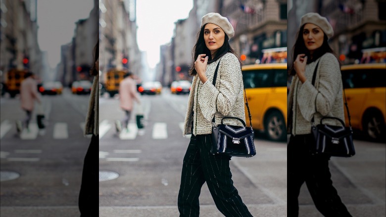 woman with beret and bag