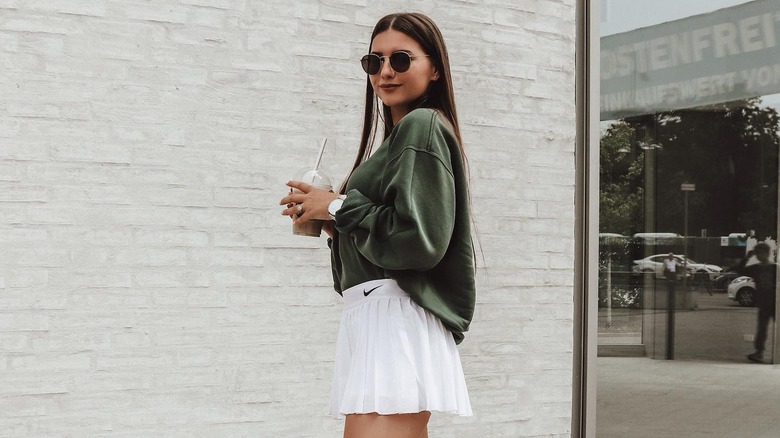 woman in white tennis skirt