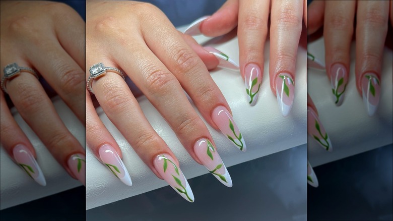 Woman with leaf nail art