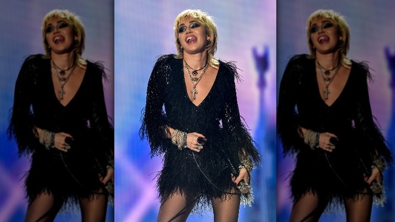 Miley Cyrus in black fringe dress 
