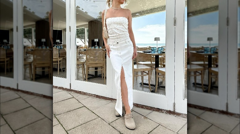 Girl in white skirt, Birkenstocks