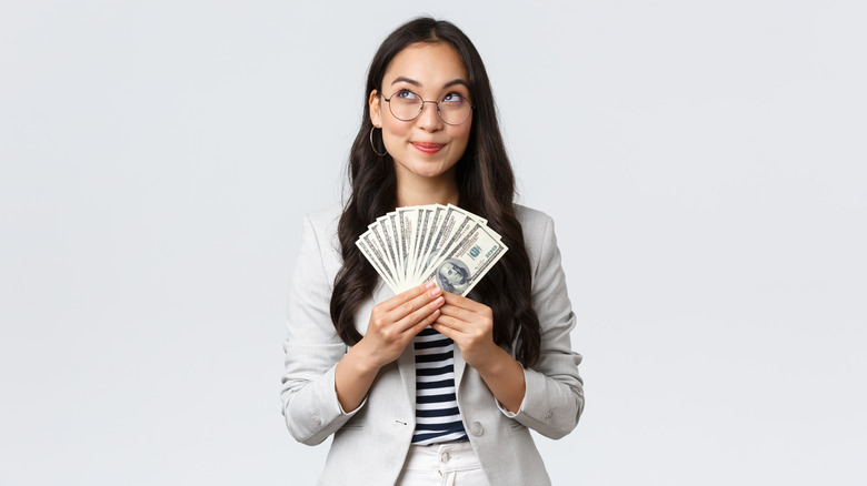 woman with cash