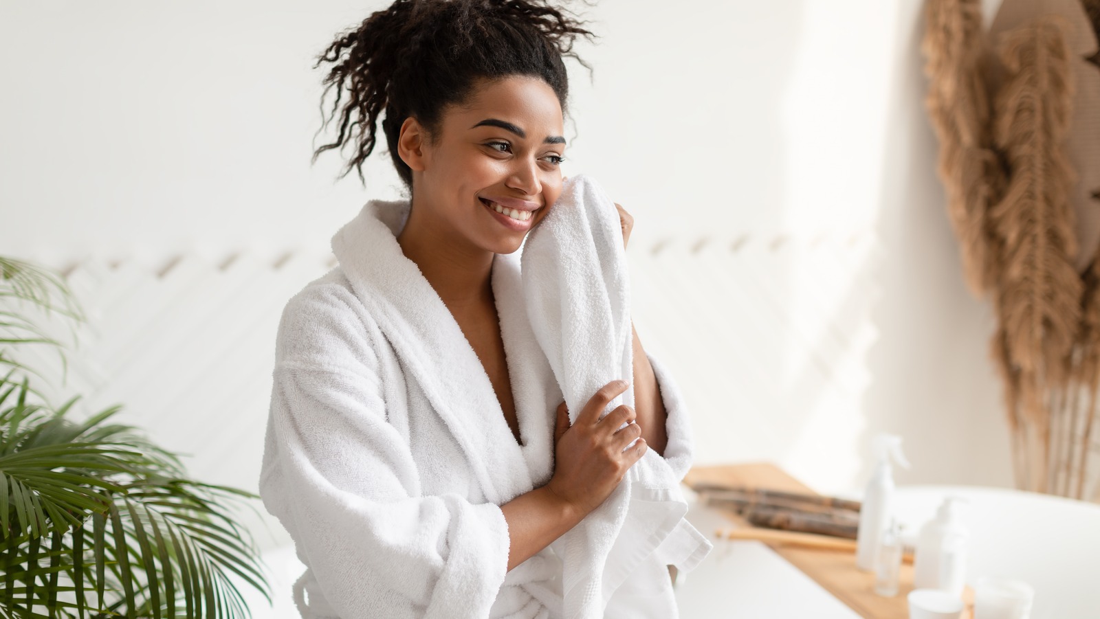 https://www.glam.com/img/gallery/your-post-shower-drying-off-technique-is-more-important-than-you-think-for-skin-health/l-intro-1683096550.jpg