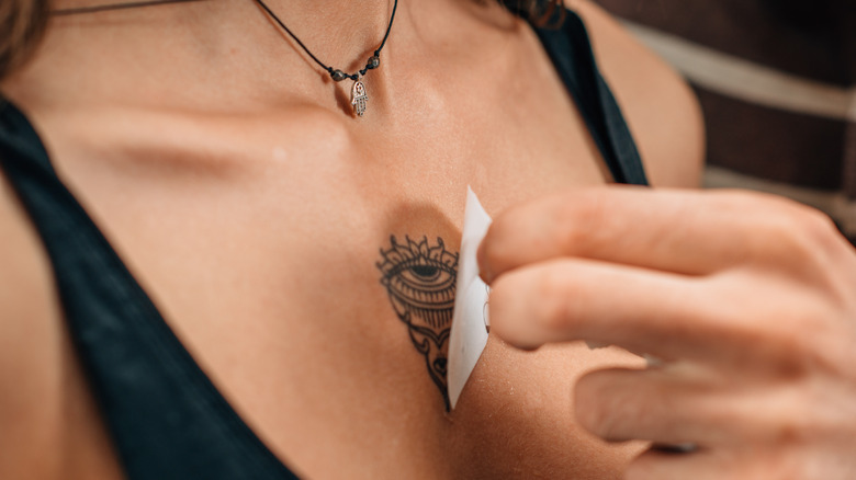 woman with sternum tattoo 