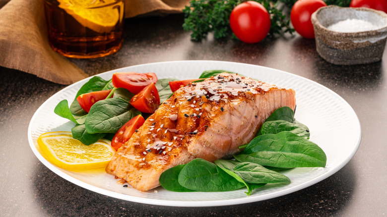 Plate with salmon and salad