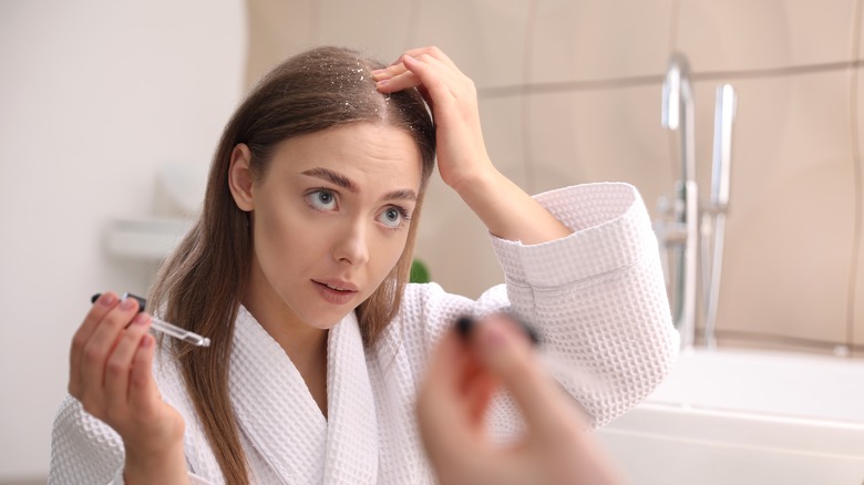 Woman applying treatment