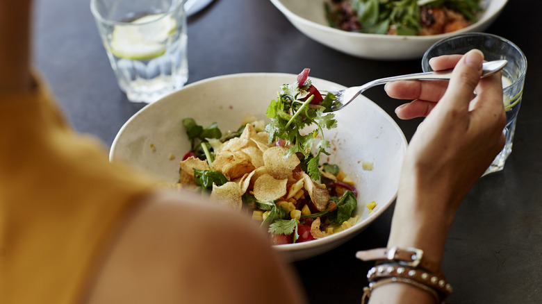 Woman eating health meal