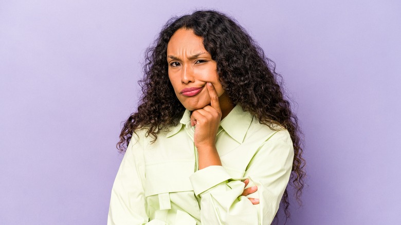 Woman with long curly hair