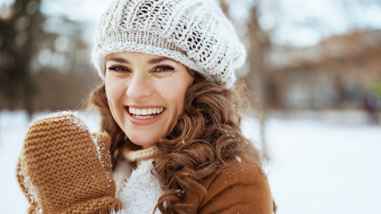 Smiling woman in winter 