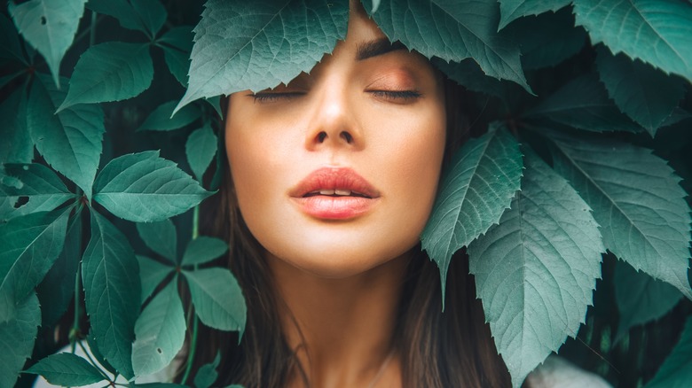 woman in leaves