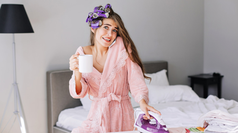 Woman with rollers in hair