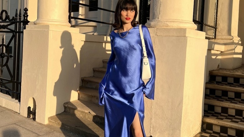 twoman in blue silk dress