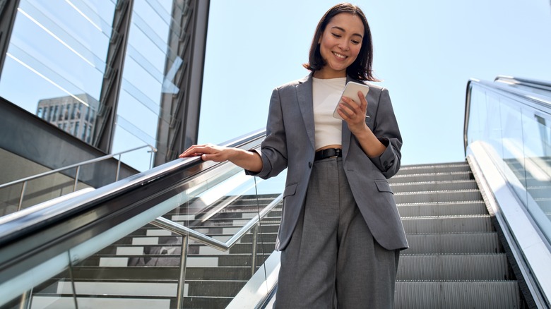 busy woman with smile on face