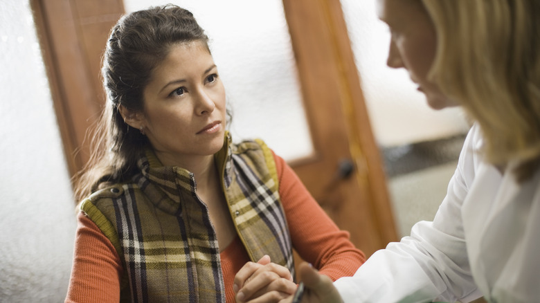 woman having serious conversation