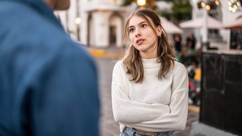 woman talking to man 