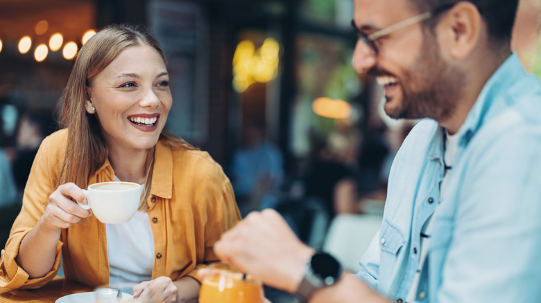 Man and woman coffee date